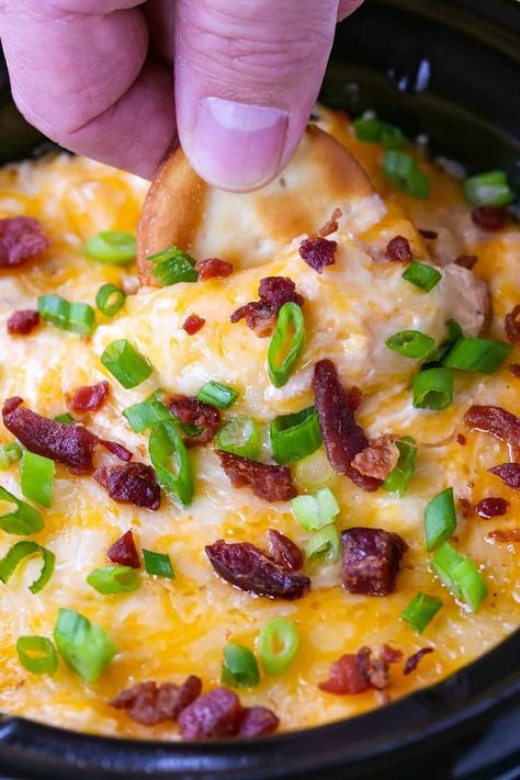 This super easy Crock Pot Buffalo Chicken Dip is always on our appetizer list! #appetizers #buffalochickendip #chickenrecipes #crockpotrecipes Dip Recipes For Chips, Crock Pot Buffalo Chicken Dip, Homemade Potato Chips Recipe, Warm Dip Recipes, Crock Pot Buffalo Chicken, Dip For Potato Chips, Baked Potato Dip, Chip Dip Recipes, Dip Recipes Hot