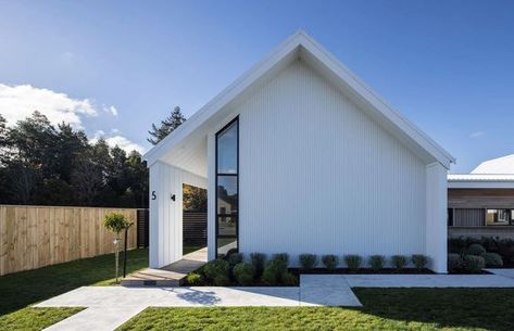 Four Gables is a simple four-bedroom family home with a clean, crisp, modern aesthetic. #gable #white #modern Simple Gable Roof House, Gable House Exterior, Gable Roof Exterior, Long Narrow House Plans, Modern Gable House, Gables On House Exterior, Scandi Exterior, Modern Gable Roof, Long Narrow House