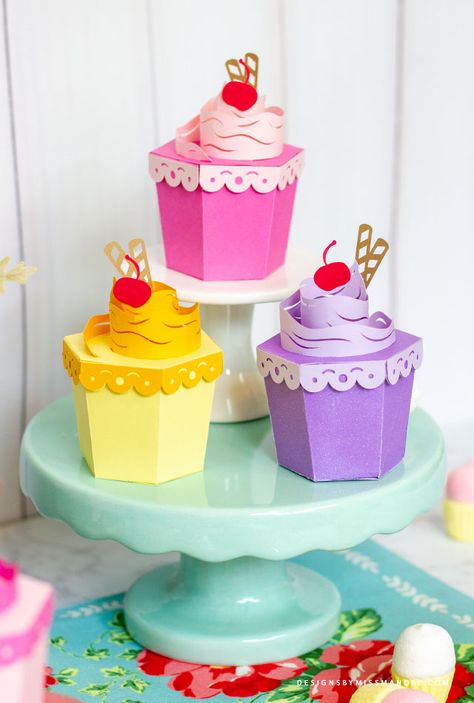 FREE 3D Cupcake Treat Boxes – 3D Cut Files - Designs By Miss Mandee. Birthday, party, 3D, 3D Cupcake Treat Boxes, 3D Cut Files, box, boxes, cake, candy, chocolate, confectionary, Cricut, cupcake, cut file, die cut, free, freebie, gift, marshmallows, silhouette, svg, treat, paper craft, 3D design. Cupcake Paper Crafts, Cake Paper Craft, Silhouettes Disney, 3d Cupcake, Cupcake Template, Paper Cakes, Cupcake Crafts, Paper Cake Box, Winnie The Pooh And Friends