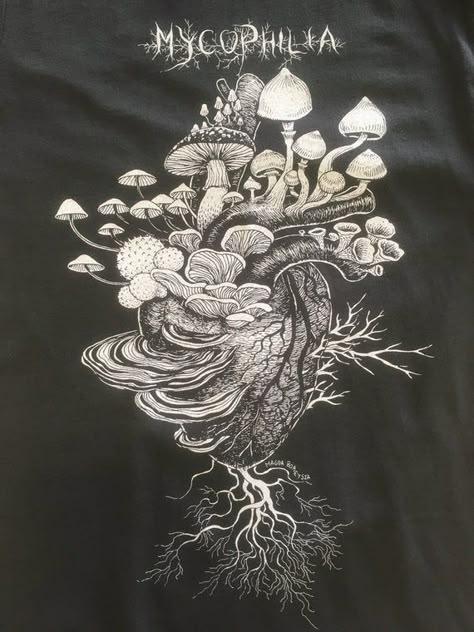 MycophiliaFor humans who love Queendom Fungi. Screen-printed. 2 colors! Pick your fave. Sizing: sizes are unisex.  For exact dimensions, you can find a sizing chart here: https://www.bellacanvas.com/spec/3001%20specs.pdfThe t shirts are made by Bella + Canvas and Alternative Apparel.100% cotton. Machine wash cold.IMPORTANT: International customers, please note that your government might charge you VAT and import fees on your order. It is your own responsibility to be aware of these and to pay th Screen Printed Bags, Bleach Shirt Diy, Sublimacion Ideas, Mushroom Shirt, Art Zine, Screen Printed Tshirts, Alternative Apparel, Bleach Art, Mushroom Art