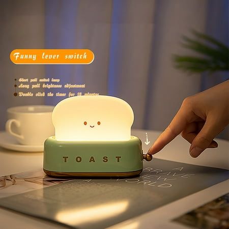 Toaster Night Gift Festive Lamp Bedroom Bedside With Sleep Timer Lamp Features: Unique Toaster Design: The lamp is shaped like a toaster with retro style and premium quality. Soft, sweet, can be used as night, table lamp and mood, blending naturally with your furniture and decoration. Lovely Desk Lamp for Long Time Use: This mini desk lamp has a built-in 800mAH battery, can be anywhere, and is small enough to leave enough space while bringing you enough brightness. Eye protection: The modern and lamps diffuse the table lamp evenly, which is pleasing to the eye and reduces eye fatigue. Provides flicker-free soft that is not as harsh as huge ceiling lights in offices or schools, greatly protecting the eye health of family and . APPLICATIONS: This room decor is for indoor use , ideal for bedr