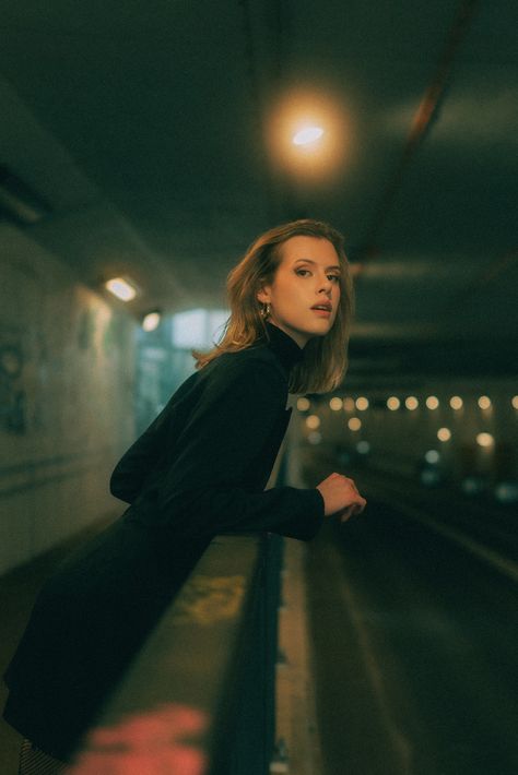 A woman leaning on a rail in a tunnel photo – Free Human Image on Unsplash Leaning On Railing, Creative Commons Images, Happy Images, Portrait Lighting, Formal Wear Dresses, Photoshoot Idea, Facial Recognition, Night Photos, Star Images