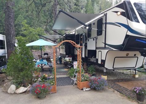 A longtime RVer is hanging up his keys and settling down in a permanent location due to RVing costs going up and campsites being more crowded. Campsite Decorating Ideas, Outdoor Screen Room, Campsite Decorating, Campsite Setup, Decorating Your Rv, Camping Picnic Table, Rv Exterior, Rv Campsite, Picnic Table Covers