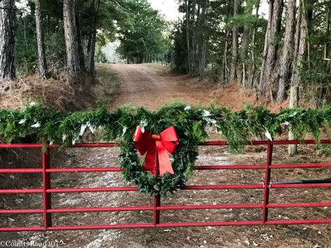 County Road 407 The easiest way to make fresh garland Wreath On Fence Gate, Long Driveway Christmas Decor, Gate Wreath, Gate Decor Ideas Outdoor, Christmas Wreath On Driveway Gate, Gate Wreath Ideas, Christmas Gates, Front Gate Christmas Decorations, Driveway Entrance Christmas Decorations