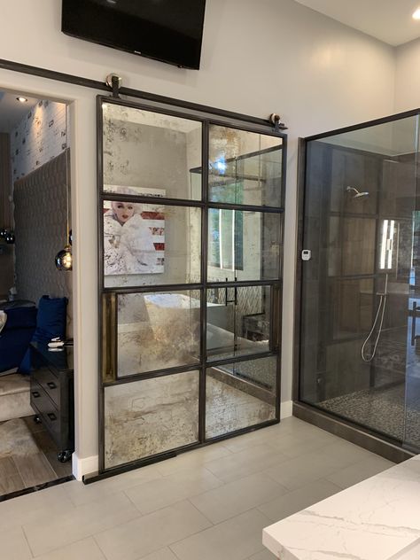 Custom made door with antique mirrors and brass accents. Timeless. Mirror Sliding Door, Mirror Barn Door, Antique Mirror Frame, Glass Pantry Door, Glass Pantry, Steel Barns, Custom Barn Doors, Contemporary Barn, Industrial Contemporary