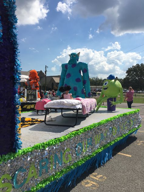 Monsters inc homecoming parade float. Disney Movie Homecoming Floats, Disney Homecoming, Run Through Signs, Homecoming Hallways, High School Football Posters, Student Council Campaign, Homecoming Floats, Senior Homecoming, Mike And Sully