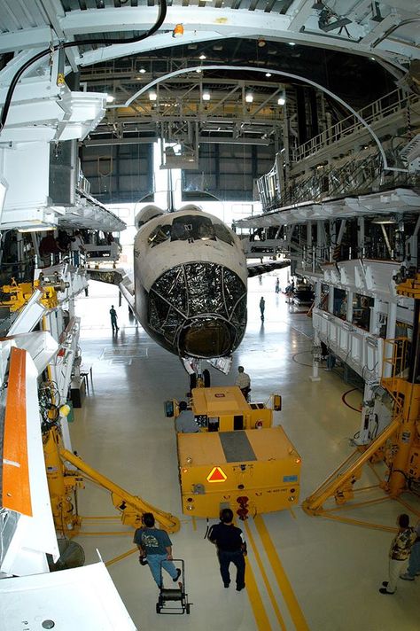 Workers prepare to tow Space Shuttle orbiter Atlantis from the OPF to the VAB. The move will allow work to be performed in the OPF that can only be accomplished while the bay is empty. Atlantis will remain in the VAB for about 10 days, then return to the OPF as work resumes to prepare it for launch in Sept 2004 on the first return-to-flight mission, STS-114. 12/05/2003. Credit: NASA Nasa Internship, Aviation Engineering, Nasa Engineer, Aerospace Design, Nasa Space Program, Space Engineers, Space Camp, Nasa Space Shuttle, Aerospace Engineering