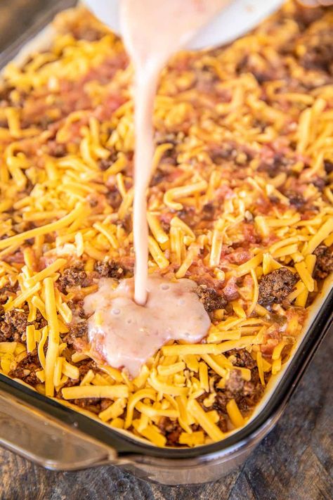 Deep Dish Taco Pie - the ultimate Mexican casserole! Taco meat, rice, corn, cheese, salsa, and eggs baked in pie crust. I mean, what's not to like?!? This makes a ton. It is perfect for a crowd. Can make the casserole in advance and refrigerate or freeze for later. We sometimes divide the recipe between two pans - bake one and freeze one for later. Top the casserole with your favorite taco toppings. Taco night never tasted so good! #taco #casserole #rice #Mexican #freezermeal Taco Pie, Corn Cheese, Mexican Casserole, Plain Chicken, Taco Casserole, Taco Meat, Beef Recipes Easy, Beef Dishes, Deep Dish