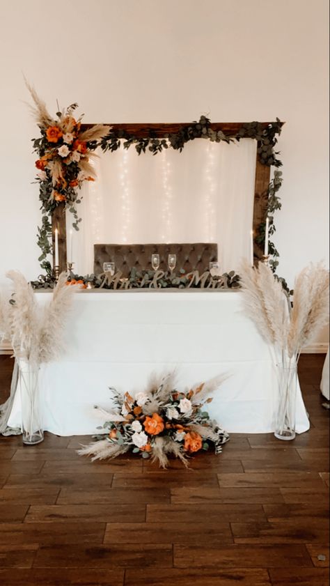 Sweetheart Table Wedding Rustic Backdrop, Me And Mrs Wedding Table, Burnt Orange Wedding Dessert Table, Simple Boho Sweetheart Table, Fall Wedding Couple Table, Boho Wedding Sweetheart Table Decor, Head Table Fall Wedding, Fall Sweetheart Table Wedding Decorations, Rustic Wedding Decor Burnt Orange