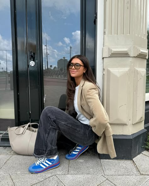 Elise Hoogerdijk | morning coffee in the park, wearing the iconic SL72 @adidasoriginals classic ad | Instagram Blue Sneakers Outfit Woman, Bright Blue Shoes Outfit, Dark Blue Sneakers Outfit, How To Style Running Shoes, Blue Running Shoes Outfit, Adidas Samba Blue Outfit, Royal Blue Sneakers Outfit, Blue Trainers Outfit, Blue Adidas Shoes Outfit