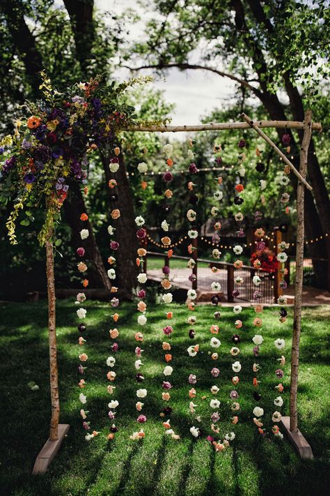 wedding altar with cascading flowers Wedding Arch Floor Decor, Hanging Flowers Altar, Hanging Flower Alter, Boho Wildflower Wedding Decor, Fall Camp Wedding Ideas, Wedding Arch With Hanging Flowers, Hanging Flowers Ceremony, Wildflower Backdrop Wedding, Wooden Wedding Altar