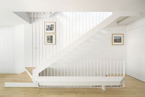 Photo 5 of 11 in A Seaside Home Near Barcelona Gets a Bright Update With a Top-Level Library - Dwell Bookcase Stairs, Staircase Photos, Glass Divider, Modern Staircases, Minimal Color Palette, Metal Railing, Seaside Home, Stone Farmhouse, Staircase Wall