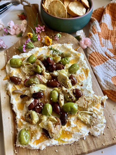 Creamy Feta Board with Lemon Roasted Artichokes and Olives Greek Butter Board, Feta Cheese Board Ideas, Creamy Cheese Board, Functional Kitchen Island Decor, Creamy Feta Board, Olive Board Appetizers, Feta Cheese Board, Whipped Feta And Olives, Healthy Christmas Charcuterie Board