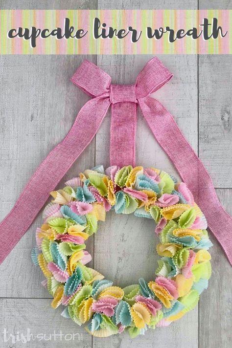 Follow this simple tutorial to create an easy DIY Dollar Store Colorful Spring Wreath for your seasonal decor made with cupcake liners, a foam craft wreath, burlap ribbon, and straight sewing pins. #wreath #spring #kenarry Wreath Diy Easy, Burlap Wrapped Wreath, Cupcake Liner Crafts, Cupcake Liner Flowers, Easter Wreath Diy, Diy Spring Wreath, Colorful Wreath, Crafts For Seniors, Simple Craft