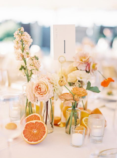 Citrus Wedding Centerpieces, Citrus Floral Centerpiece, Muted Citrus Color Palette, Bridal Shower Ideas Citrus, Sunset Floral Wedding, Citrus Wedding Table Decor, Citrus And Sunset Theme, Citrus Flower Arrangements, Wedding Centerpieces With Fruit