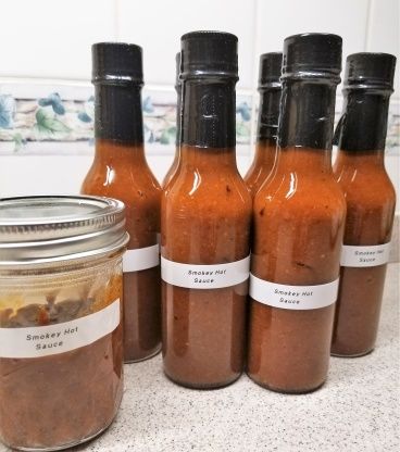 Made using Chipotles, smoked salt and cumin giving that yummy smokiness. The heat is also from the chipotles, fresh jalapenos, and ghost peppers so be warned its HOT! Make nice hot gifts! Hot Sauce Recipe, Smoked Chili, Smoked Salt, Smoked Jalapeno, Red Jalapeno, Homemade Hot Sauce, Habanero Hot Sauce, Hot Sauce Recipes, Ghost Peppers