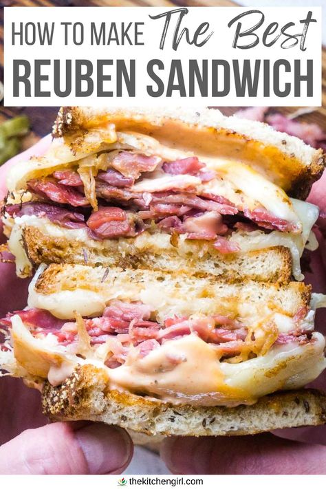 image of person's hands holding a stacked, saucy Reuben sandwich. The title text overlay at the top of image that says "How to make the best Reuben sandwich" Corned Beef Sandwich Ideas Rye Bread, Corned Beef Brisket Sandwich, Best Reuben Sandwich Recipe, Deli Corned Beef Recipes, Ruban Sandwich Recipes, Corned Beef Sandwich Ideas, Reubens Sandwich, Reuben Sandwich Sauce, Reuben Sauce