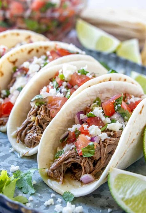 Close up photo of street tacos with pico, sauce and cheese Mexican Dinner Recipes Tacos, Instapot Street Tacos, Shredded Beef Tacos Instant Pot, Insta Pot Shredded Beef Tacos, Pressure Cooker Shredded Beef Tacos, Instant Pot Barrio Tacos, Steak Taco Recipe, Flank Steak Tacos, Street Taco Recipe