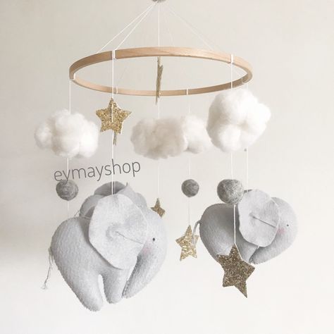 New mobile...🧡✨ I have few combinations of colors elegants and stars ⭐️🌟🌟 Cot Decor, Elephant Nursery Girl, Elephant Baby Mobile, Felt Baby Mobile, Llama Decor, Elephant Mobile, Elephant Nursery Decor, Mobile Hanging, Handmade Elephant