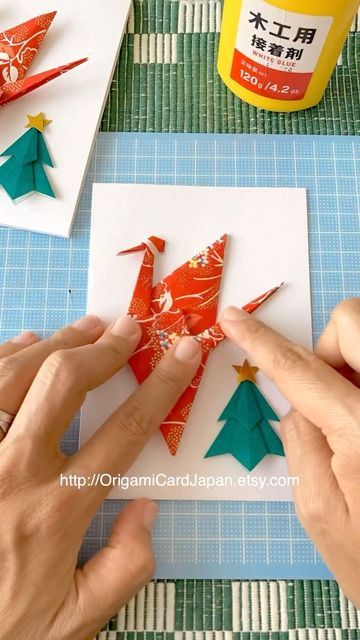 Origami Card Japan by Kanna on Instagram: "100% handmade 👋 After folding all pieces, I put them together and make Origami collage art. It becomes an Origami Card 💌 This is behind the scenes of making Origami Crane Christmas Cards 🎄 They are available in my Etsy Shop 😊 https://origamicardjapan.etsy.com/listing/1568702714 @origamicardjapan My Etsy Shop; https://origamicardjapan.etsy.com (Links in Bio) #origamicard #origamiart #origamicardjapan #japanese #traditionalart #japaneseart #origamicr Origami Christmas Cards, Japanese Christmas Cards, Origami Card, Making Origami, Japanese Christmas, Origami Cards, Papercraft Ideas, Christmas Origami, Japanese Craft