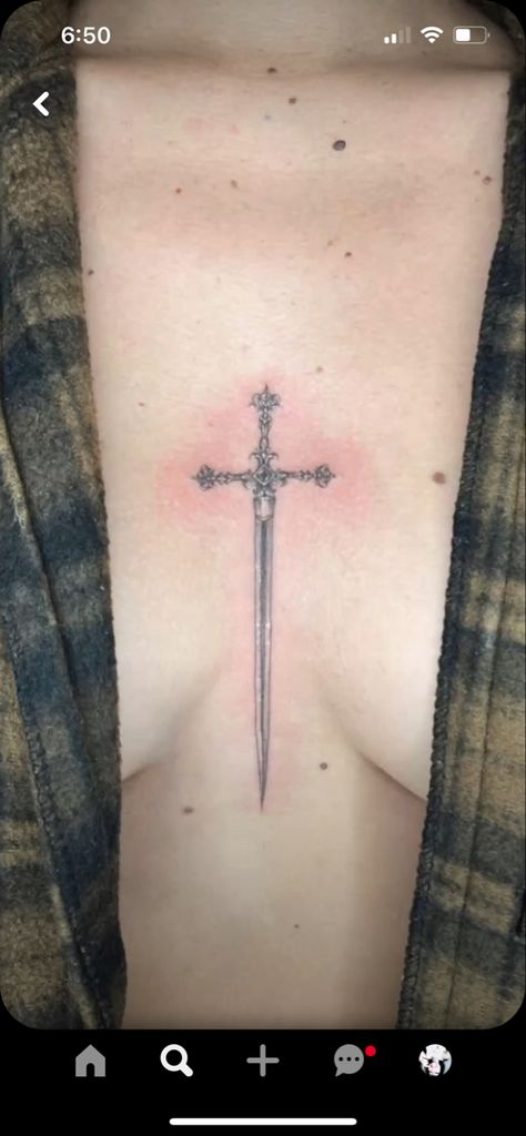 Women Sternum Tattoo Ideas, Swords Chest Tattoo, Knife Tattoo Chest, Knife Between Chest Tattoo, Cross Sternum Tattoo Women, Cross Between Breast Tattoo, Chest Tattoo Female Cross, Sternum Knife Tattoo, Cross Sternum Tattoo