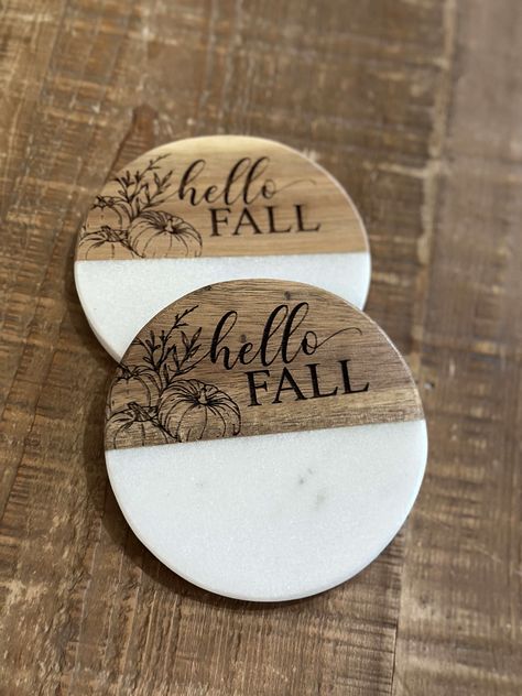 Coasters are a necessity for every home. Yours should reflect your style. Our wood and white coasters can be engraved to do just that: our sunflower coasters add a fall flair to any tabletop. Marble and wood Please note: Marble is a natural product. Variations in color, and texture, plus noticeable cracks and flaws are to be expected as that is the nature of the product Each coaster may be different in marbling and wood color. Measures 4" x 4" Wipe clean Includes foam bottom pads to protect furniture Imported Riser sold separately Style Coasters Finish Hello Fall Sunflower Dimensions 4 x 4 Design Marble and wood Please read our FAQ page prior to purchasing. Install the included handles and use a barrier between our tiered tray and food.