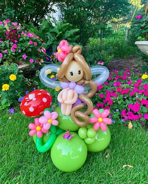 SAS Designs on Instagram: "I hope you have a fairy nice day! 🧚‍♀️ I have a greater appreciation for balloon twisters. This was my first attempt at the art of balloon twisting. Sure, I can make simple flowers but this was next level. Hats off to my Twister Sisters! Not sure if I have the patience for this long term but fun to learn a new technique! 🎈 #haveafairyniceday #twistersisters #fairyballoons #balloonbouquet #balloonbouquets #fairyparty #ballooncenterpiece" Balloon Twisting Hats, Fairy Balloon Decorations, Gnome Birthday, Baloon Art, Balloon Bouquet Delivery, Balloons Art, Candy Theme Birthday Party, Twisting Balloons, Floating Balloons