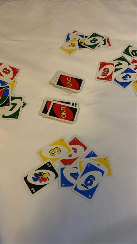 A fun game of Uno at a party with friends Playing Uno Aesthetic, Uno Aesthetic, Christmas Sleepover, Dump Photos, Acubi Style, Play Uno, Fake Photos, Uno Cards, Playing Card Games