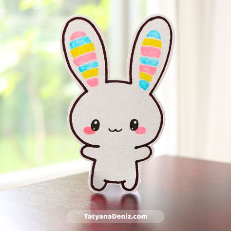 How to draw kawaii Easter bunny step-by-step (with video), and how to create a paper craft project to decorate your home for Easter. Great for drawing with kids, Easter holiday DIY decorations, staying home and kids activities. Kawaii art and tutorial by Tatyana Deniz ©TatyanaDeniz.com #kawaiianimals #howtodraw #papercrafts #kidsactivities #tatyanadeniz Kawaii Easter Drawing, Easy Bunny Drawing, Easter Kawaii, Kawaii Easter, Printable Easter Activities, Draw Kawaii, Bunny Sketches, Easter Drawings, Bunny Painting