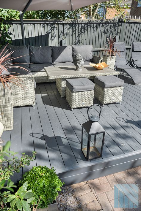 Modern garden design with anthracite grey decking Grey Garden Decking, Decking Furniture Ideas, Garden Ideas Decking, Grey Decking Ideas Garden, Cream Decking, Grey Garden Ideas, Small Decking Area, Composite Decking Ideas Garden, Garden Decking Ideas Layout