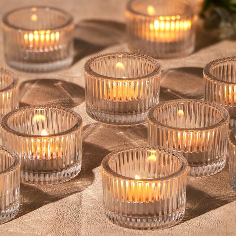 PRICES MAY VARY. 【Clear Votive Candle Holders】You will receive 24 pieces of clear votive candle holders, exquisite relief line shape combined with clear, our glass votive candle holders will create a relaxing and romantic atmosphere for you, perfect for wedding decorations. 【Home Decor】HAVITI clear glass votive candle holder has a special line design, which allows the tea candle holder to reflect more light. Sparkling candle holders can easily enhance the atmosphere of your home decoration and a Votive Candle Centerpieces, Small Votive Candle Holders, Battery Lamps, Tea Light Candles Wedding, Simple Table Decorations, Candle Votives, Sparkling Candle, Wedding Candles Table, Lighted Centerpieces