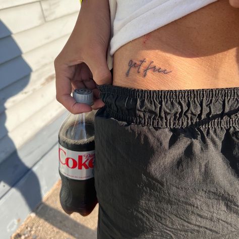 lana del rey “get free” hip tattoo Into The Blue Tattoo Lana, Tattoos Inspired By Lana Del Rey, Hip Tattoo Small Men, Ldr Inspired Tattoos, Out Of The Black Into The Blue Tattoo Lana, Small Lana Del Rey Tattoo, Lana Del Rey's Tattoos, Lana Del Ray Inspired Tattoos, Get Free Lana Del Rey Tattoo