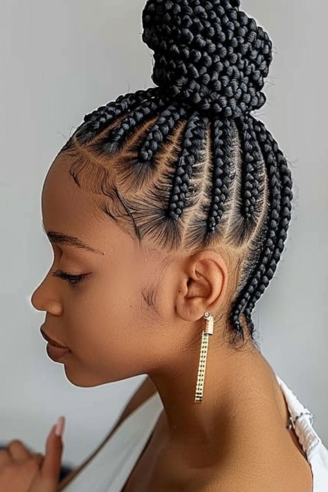 The perfect updo! This high bun with intricate cornrows is ideal for formal events or just adding a touch of elegance to your everyday style. Cornrow Updo Hairstyles Buns, Updo Cornrow Hairstyles, Cornrows Into A Bun, Intricate Cornrows, Updo Cornrows, Braided Bun Updo, Goddess Cornrows, Vacay Hair, Cornrow Updo Hairstyles