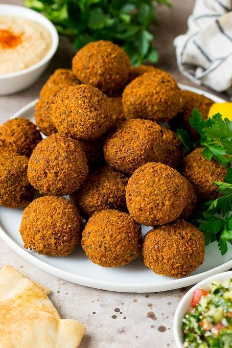 This falafel recipe is dried chickpeas blended with herbs and spices, then formed into patties or balls and fried to golden brown perfection. Greek Food Party, Healthy Falafel Recipe, Dried Chickpeas, Baked Falafel, Baking Soda And Lemon, Falafel Recipe, Dry Chickpeas, Roasted Walnuts, Baked Dinner