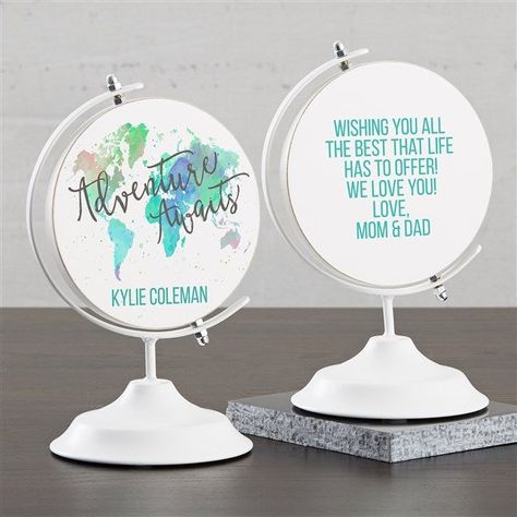 Personalize with any name on the front and message on the backChoose phrase and color Printed on both sidesFlat, wooden globe piece is made from MDFFlat bottom, metal stand allows for stable standingMetal stand includes swivel feature, once assembledIncludes feet to protect furnitureAppropriate for indoor useGlobe piece is approximately 5.5" diameterBase bottom measures approximately 4.5" diameterOverall measures 5.75" W x 9.25" HConstructed from MDF and metalWipe CleanAssembly requiredImported Wooden Globe, Dorm Gifts, Travel Party Theme, Globe Decor, Conference Design, Classroom Inspiration, Travel Party, Gift Graduation, Holiday Stockings