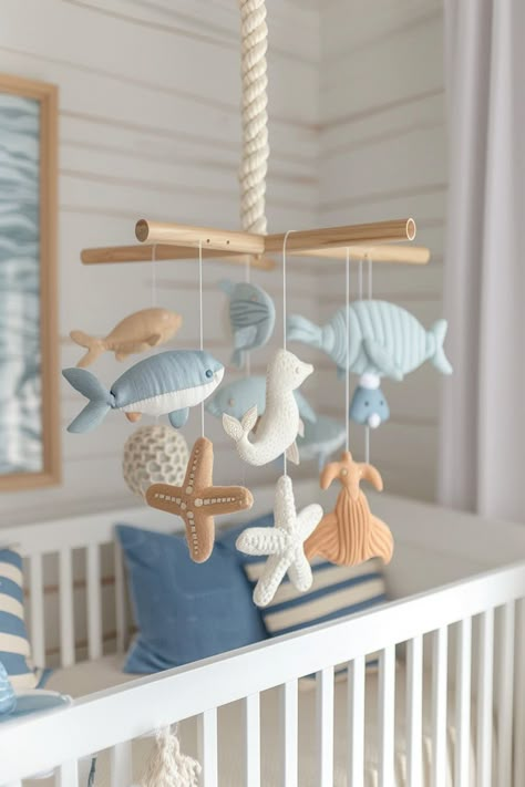 Top 20 Coastal Nursery Decor Tips | Green Snooze Nursery Themes Under The Sea, Dolphin Nursery Theme, Nautical Decor Nursery, Sea Life Nursery Theme, Ocean Animals Nursery, Sealife Nursery Ideas, Nursery Ideas Ocean Theme, Coastal Baby Boy Nursery, Baby Nursery Ocean Theme