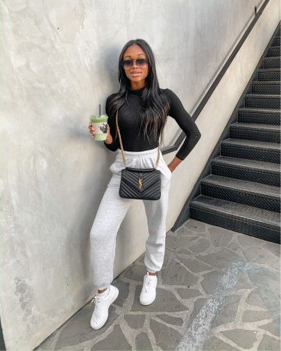 Grey Joggers, Black Bodysuit, Travel Outfit, White Sneakers, YSL College Bag @liketoknow.it #liketkit http://liketk.it/2LiUm #LTKspring #LTKstyletip #LTKsalealert Grey Jogger Sweatpants Outfit, Cute Joggers Outfits, Outfit Grey Sweatpants, Trendy Outfits With Sweatpants, Jogger Outfits, Looks Adidas, Cute Sweatpants Outfit, Mode Zara, Joggers Outfit