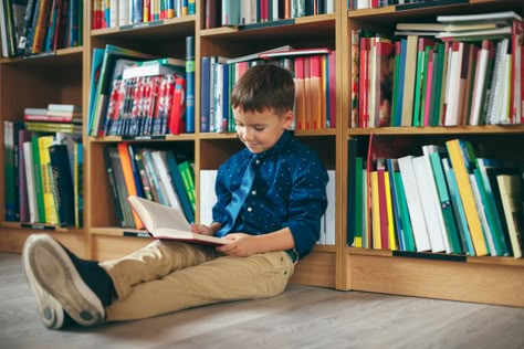 Colored Bookshelf, Library Photo Shoot, Colorful Bookshelf, The Company You Keep, Photography Jobs, Boy Drawing, Catholic School, School Pictures, Reading A Book