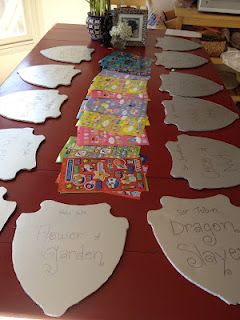 Decorating shields and other knight party ideas. [Ethan's 6th birthday party] Knight Party Ideas, Dragons Birthday Party, Brave Birthday Party, Knight Birthday Party, Zelda Party, Castle Party, 6th Birthday Party, Zelda Birthday, Dragon Birthday Parties