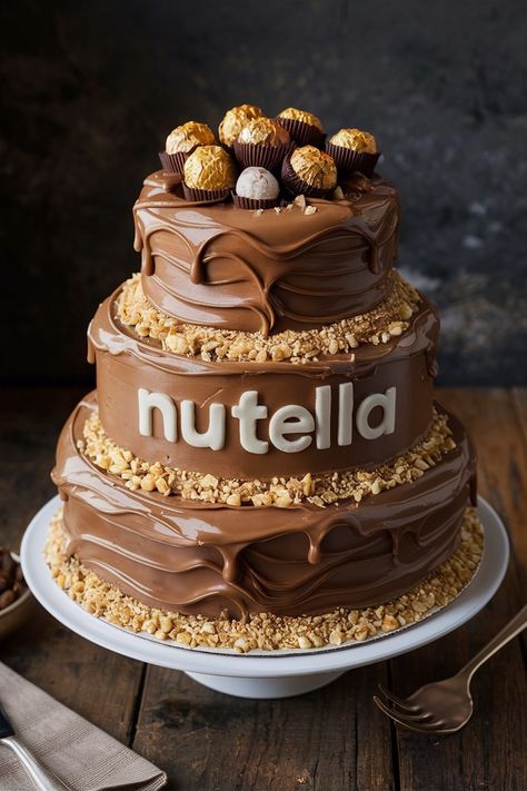 Nutella Nirvana: A Decadent Dream Cake Idea for Chocolate Lovers Nutella Birthday Cake, Hazelnut Mousse, Ferrero Rocher Cake, Birthday Cake Decorating Ideas, Ferrero Rocher Chocolates, Nutella Spread, 18th Birthday Cake, Cakes Recipes, Birthday Cakes For Women