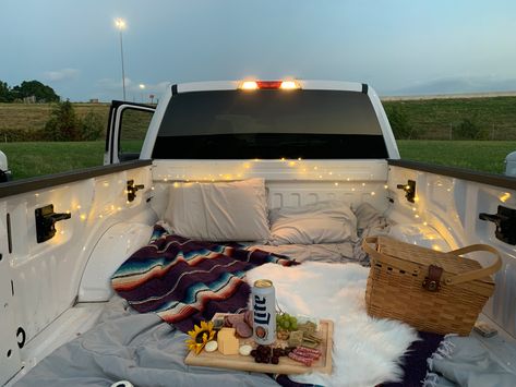 Picnic Truck Bed, Date Night Back Of Truck, Back Of Pickup Truck Date, Truck Box Date Night, Trunk Sunset Date, Truck Bed Date Romantic, Back Of Truck Picnic, Back Of Truck Movie Night, Picnic In The Back Of A Truck