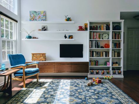 TV wall with Besta cabinets (DIY Walnut fronts), joined and trimmed Billy bookcases, and stock Malm floating shelves - Imgur Floating Shelves Tv Wall, Floating Shelves Tv, Ideas Decoracion Salon, Shelves Around Tv, Ikea Floating Shelves, Billy Ikea, Tv Fal, Long Floating Shelves, Floating Shelves Bedroom