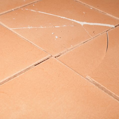 Repair broken tile to eliminate an eyesore and prevent water damage. This Home Depot guide teaches you how to fix broken tile in your bathroom or kitchen floor. Fix Cracked Tile, Grout Repair, Putz Hacks, Tile Repair, Vinyl Pool, Paint Matching, Tile Grout, Flooring Ideas, Diy Home Repair