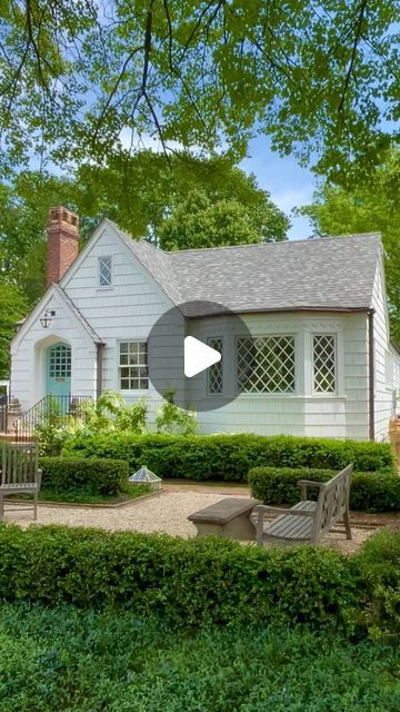 TONE ON TONE | Loi & Tom on Instagram: "Something new at our cottage……
🏡☀️🌳
We just had the front door (original to our 93 yr old house) restored and repainted.
Color is Dix Blue by Farrow & Ball, in full gloss finish.

Also, the Winter gem boxwood hedge got a fresh trim. We are letting the four corner balls get bigger.

#cottagestyle 
#frontyard
#smallgarden
#cottages 
#cottagehome
#annapolis" Chimney In Front Of House Exterior, Winter Gem Boxwood, Dix Blue, Landscaping Around House, Boxwood Hedge, Cottage Exteriors, Dream Yard, Four Corners, Something New