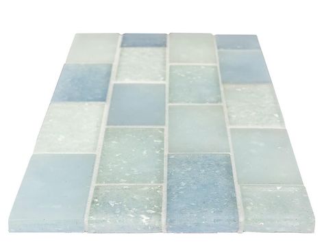 Fluid Subway Glass Tile C Blend 2x4 is handmade using a combination of upcycled frosted and glossy glass with a passion for design in tiles. The Fluid Glass Tile Collection is suitable for kitchen backsplash, bathroom, shower, floor, walls, swimming pools, and spas.This artesian glass mosaic tile is face-mounted on a 14''x 16" sheet for an easy installation. The slight surface variations are inherent to this product due to the handcrafted manufacturing process and add to the aesthetic value of t Glass Tile Backsplash Kitchen, Second Bathroom, Recycled Tile, Glass Tile Backsplash, Glass Subway Tile, Beach Bathrooms, World One, Kitchen Tiles Backsplash, Glass Mosaic Tiles