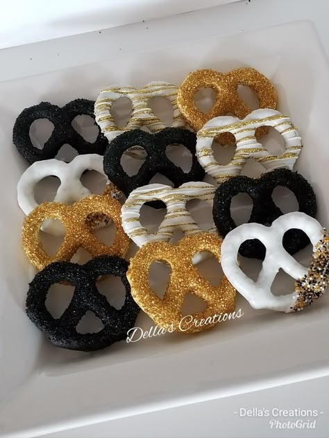 Black And White Sweets Table Ideas, Black And White Pretzels, Gold Treats, Black And Gold Chocolate Pretzels, Chocolate Covered Pretzel Ideas, Black White And Gold Desserts, Gold Pretzel Rods, Chocolate Covered Pretzels Birthday, Black And Gold Desserts