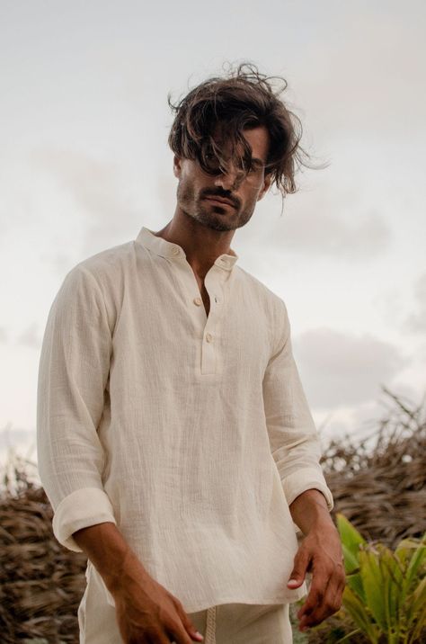 If you want to order but are not sure it will arrive in time for your trip, me and my team also deliver some items in Tulum and Playa del Carmen. If you need express shipping send me a message to check custom express shipping rates. Loose fit gauze shirt with wood buttons, inspired by life on the caribbean so comfortable for the skin and movement, ideal for those really hot days where you wish for a fabric that lets the air pass through. Care Instructions : Dry Cleaning Fausto Betancourt is a sl Banded Collar Shirts, Holiday Clothing, Gauze Shirt, Shirt Linen, Beige Outfit, Linen Shirt Men, Popover Shirt, Mens Linen, Boho Shirts