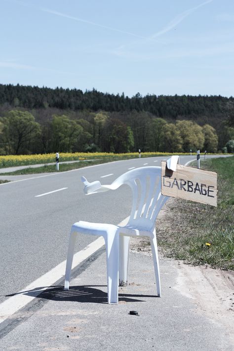 White Plastic Chair, Recycled Furniture Design, White Plastic Chairs, Empowerment Art, Chair Pictures, Modern Metropolis, Art Chair, Lawn Chairs, Plastic Chair