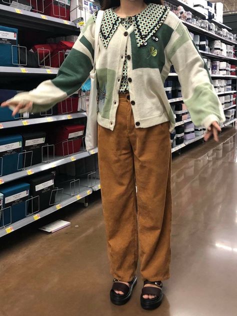 block green cardigan with brown pants and chunky sandals Studio Ghibli Cardigan, Ghibli Aesthetic Outfit, Ghibli Core Outfit, Studio Ghibli Inspired Outfits, Ghiblicore Outfits, Studio Ghibli Clothes, Ghibli Inspired Outfits, Studio Ghibli Outfits, Studio Ghibli Fashion