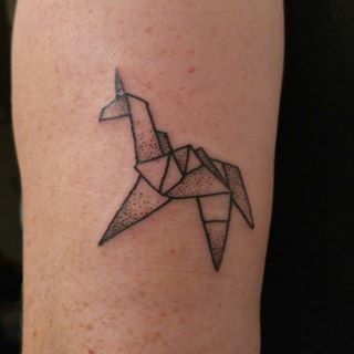 An origami unicorn is a great option for whimsical minimalists: | 20 Magical Unicorn Tattoos Origami Unicorn Tattoo, Runner Tattoo, Origami Unicorn, Tattoo Lounge, Pen Doodles, Unicorn Tattoos, B Tattoo, Beautiful Unicorn, Unicorn Lover